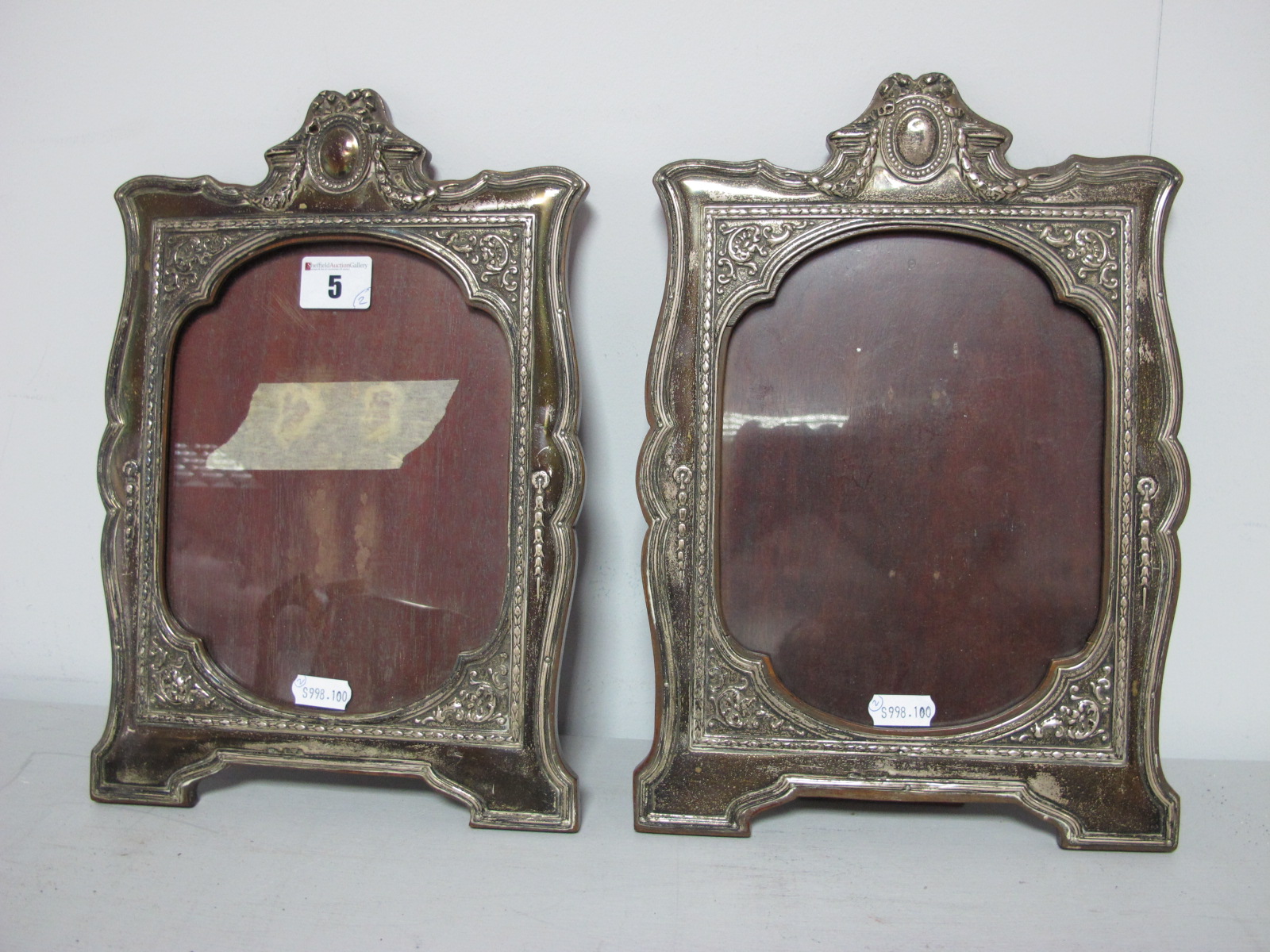 A Pair of Chester Hallmarked Silver Mounted Photograph Frames, (makers marks indistinct) Chester