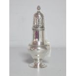 A Georgian Hallmarked Silver Sugar Caster, R. Peaston, London 1771, with pierced pull off cover,