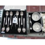 A Set of Eight Hallmarked Silver Coffee Spoons, JE&S, Sheffield 1941, in original fitted case;