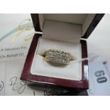 A Gent's Modern Three Row Diamond Set Ring, of uniform design channel set, stamped "750" (finger