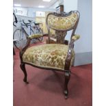 Early XX Century Mahogany Salon Chair, with a canted top rail, with upholstered backs arms and seat,