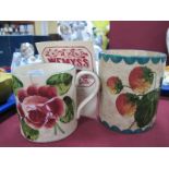 A Wemyss Pottery Mug, painted with roses and a circular pot, painted with strawberries, both