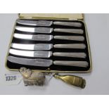 A Matched Set of Six Silver Handled Tea Knives (damages); together with a novelty Middle Eastern