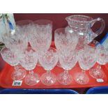 XIX Century Wine Glass, cut glass water jug, cut glass wine and sherry glasses:- One Tray