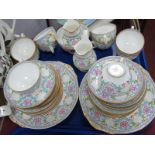 Minton Early XX Century Floral Tea Service, of thirty-eight pieces.