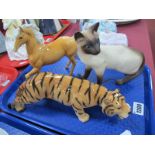 Beswick Pottery Siamese Cat and Prancing Horse, pottery Tiger, stamped '29'. (3)