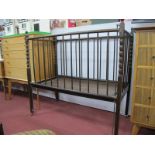 A Late XIX/Early XX Century 'Patent Autocot' Folding Cot, with turned decoration.