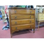 A 1920's Walnut Chest of Four Drawers, on turned legs, 91cm wide.