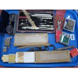 Omega Lighter, slide rule, miniature "Pygmy" lighter, technical drawing instruments:- One Tray