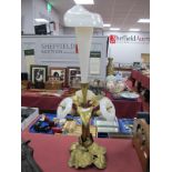 A Brass Table Centrepiece, with leaves and white glass flowerheads, with central trumpet shaped