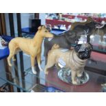 A Beswick Figurine "Cutmil Cupie", together with two Beswick figurines of an Elephant and a