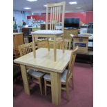 Four Caxton Light Wood Rail Back Dining Chairs, and extending dining table.