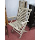 Four Hardwood Folding Steamer Chairs.