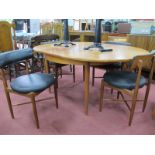 G Plan Circular Topped Teak Dining Table, with pull out leaf extensions, together with four