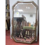 A 1920's Oak Framed Rectangular Bevelled Wall Mirror, with cantered corners.