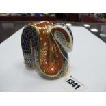 A Royal Crown Derby Paperweight as a 'Snake', date code for 1989, gold stopper, red printed mark (