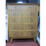 A 1960's Walnut Chest of Two Short and Four Long Drawers, on splayed legs, with retailers label