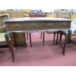 An Edwardian Mahogany Ladies Desk, with scriver inset to rectangular top, over two drawers, on