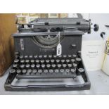 An Early XX Century Imperial Typewriter, Model 50, with instruction book.