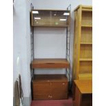 Ladderax Book Shelves, with cast metal supports.