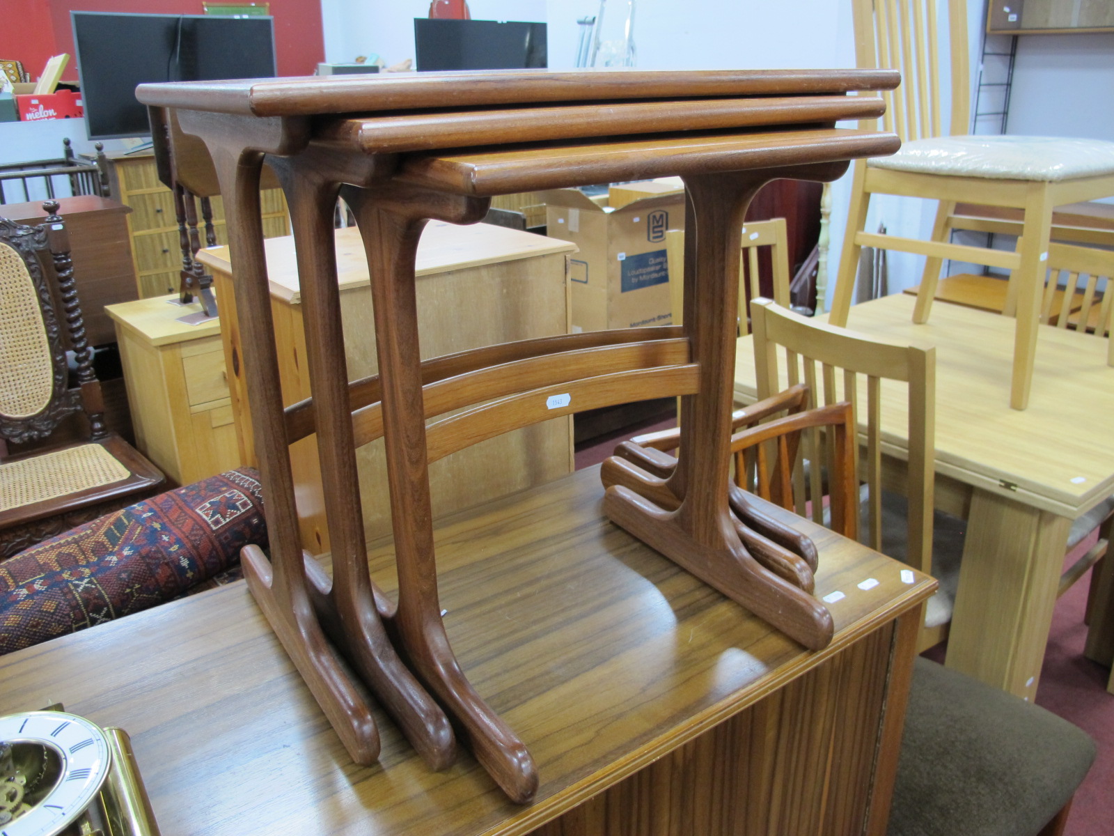 Nest of Three G Plan Teak Coffee tables, with rectangular tops and curved stretchers to trestle