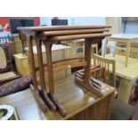 Nest of Three G Plan Teak Coffee tables, with rectangular tops and curved stretchers to trestle