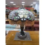 Tiffany Style Table Lamp, with tasselled drops to mushroom shade, approximately 51cm high.