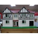 Tri-ang Dolls House, mock Tudor double fronted, 86cm wide, a quantity of dolls house furniture.