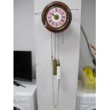 XIX Century Postman's Clock, labelled T. Lovejoy, Wimbledon, having black Roman numerals to pink