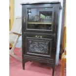 A Late XIX Century Ebonized Display Cabinet, with glazed door over fall front, 58cm wide.