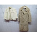 A Full Length Light Beige Fur Coat, with mock double breasted military style buttons, half belt to