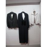 Amanda Wakeley London; An Ankle Length Navy Pinstripe Wool Crepe Coat, fitted, with fringed scarf
