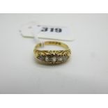 A Chester Hallmarked 18ct Gold Victorian Style Ring, graduated set between ornate setting and