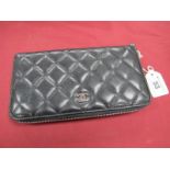 A Chanel Quilted Black Lambskin Ladies Wallet, silver tone logo and zip, inner zipped pocket and