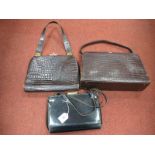 A Post-War Vintage Gucci Austerity Design Black Leather Handbag; with outer leather case which