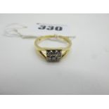 An 18ct Gold Diamond Set Ring, two rows claw set, between openwork bifurcated shoulders (finger size