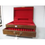 A Community Oak Canteen Case, with lift up lid and base drawer, red lined, complete with key, base