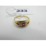 An 18ct Gold Victorian Style Dress Ring, with alternate graduated inset highlights, within