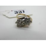 A 9ct Gold Two Cluster Style Dress Ring, claw set throughout, between crossover shoulders (finger