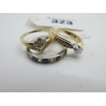 A Modern Wishbone Style Ring, with claw set and inset highlights, stamped "375" (finger size N) (