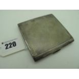 A Hallmarked Silver Cigarette Case, Birmingham 1933, of square form allover engine turned, inscribed