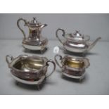 A Jenkins & Timm Early XX Century Plated Four Piece Tea Set, each with wavy edge, raised on four pad