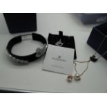Swarovski; A Small Collection of Crystal Jewellery, including an ornate bangle, a pendant and a