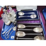 A Decorative Set of Four Late XIX Century Plated Serving Spoons, in original fitted case; together