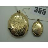 A Large 9ct Gold Oval Locket Pendant, (marks rubbed) leaf scroll engraved to the front (4cm long