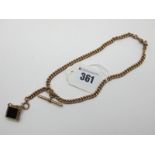 A Graduated Curb Link Chain, stamped "9.375", suspending T-bar style pendant, stamped "9.375" and