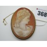 A Large 9ct Gold Oval Shell Carved Cameo Brooch, depicting female profile, collet set.