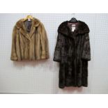 A Beige Mink Jacket, the bell shaped sleeves with button detail to cuff and two button front