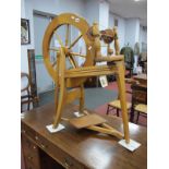 A Modern Spinning Wheel, with foot pedal.