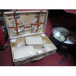 A Sirram Picnic Case, with contents (no flasks) and floral teaware etc in a vanity case. (2)